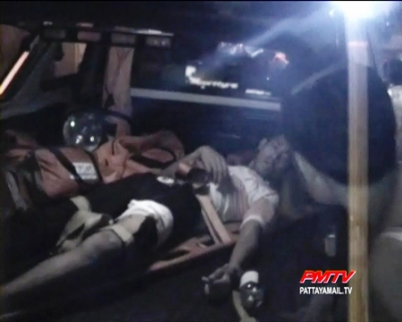 The young gang member is taken away in the ambulance